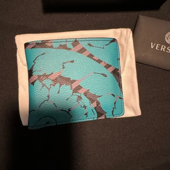 Versace blue multicolor leather La Greca bifold wallet.